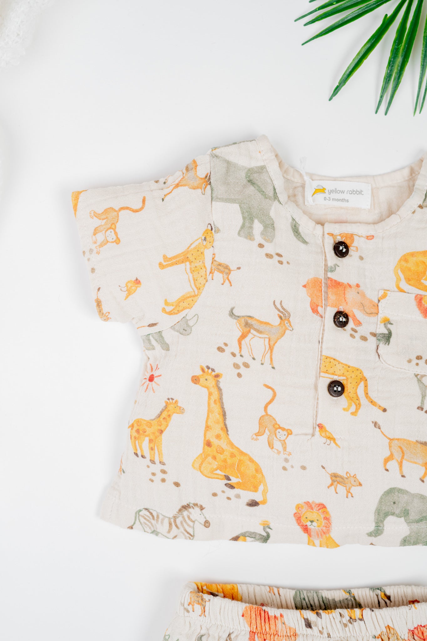 Soft organic cotton infant jhabla set with sleeves and matching diaper cover in Serengeti inspired safari print- cozy and stylish outfit for infants.