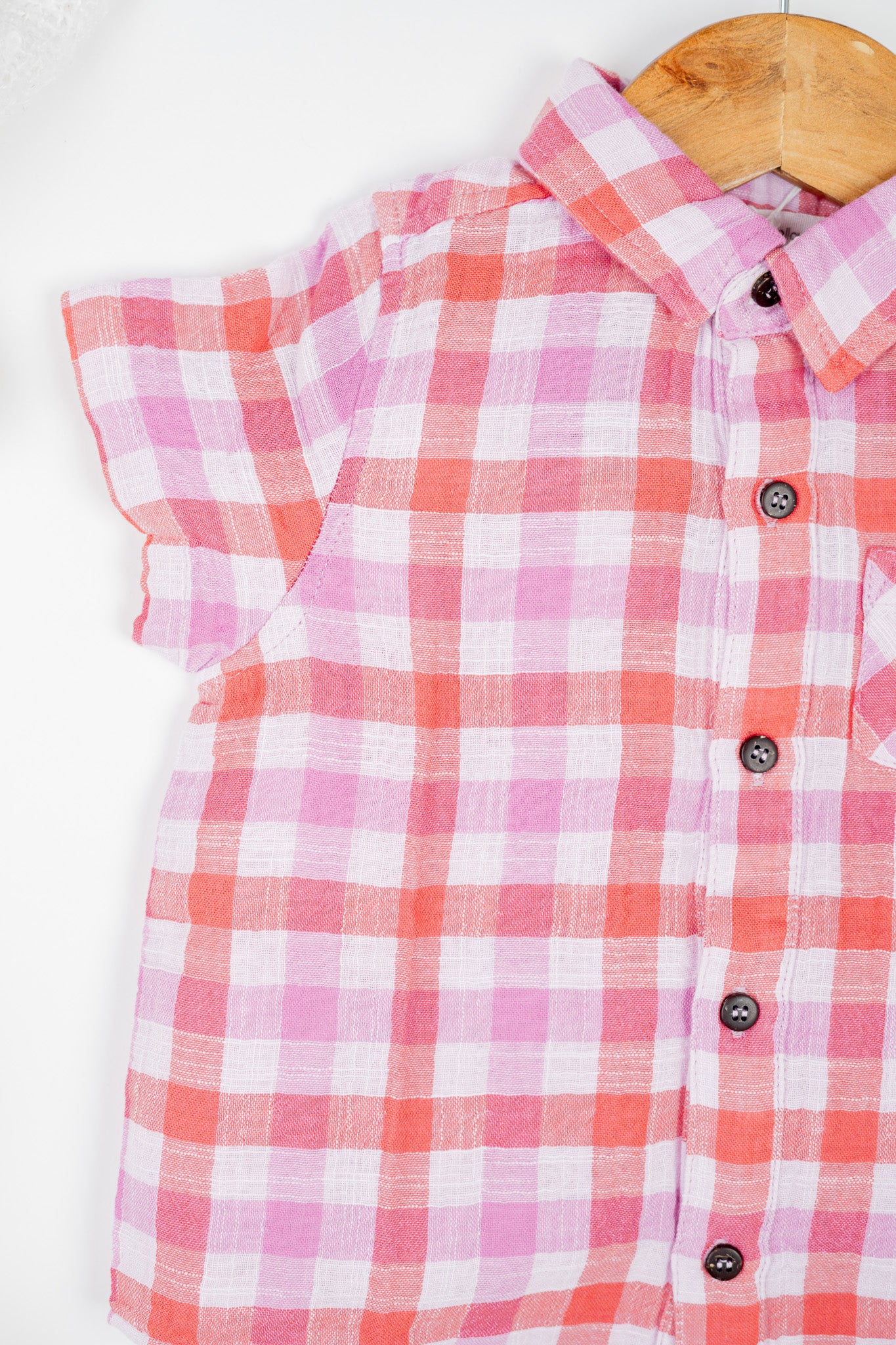 Boy's button-down double muslin organic cotton shirt, featuring deep red and purple checks and a classic collar.