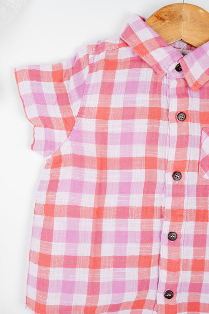 Boy's button-down double muslin organic cotton shirt, featuring deep red and purple checks and a classic collar.