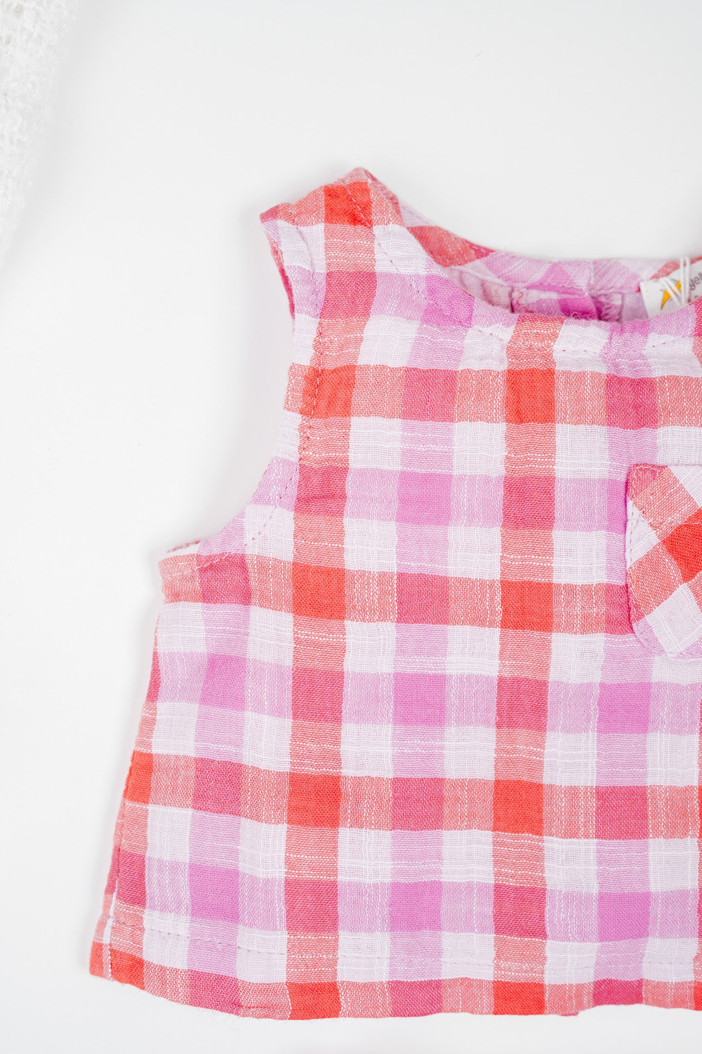 Soft, breathable, organic cotton deep red and muted purple checked infant sleeveless jhabla set with bloomer- for everyday use.