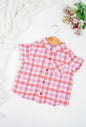 Boy's button-down double muslin organic cotton shirt, featuring deep red and purple checks and a classic collar.