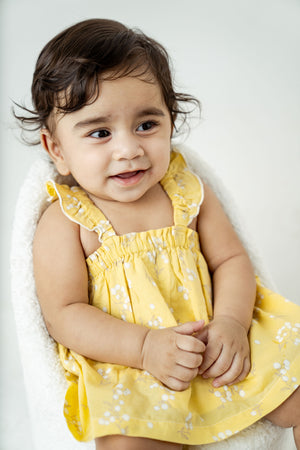 Yellow ruffle strap top and  bloomer set with white flowers, for infants