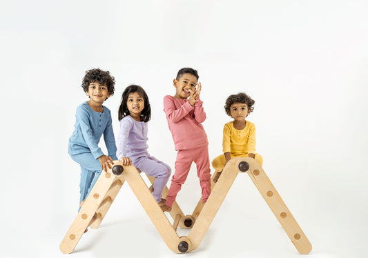 Unisex knitted organic cotton pajamas for babies and toddlers - soft, breathable, and designed for everyday comfort.