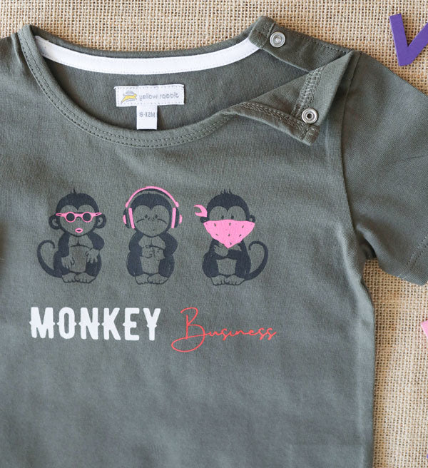 Olive green cotton kids' t-shirt with fun "Monkey Business" monkey print.
