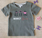Olive green cotton kids' t-shirt with fun "Monkey Business" monkey print.