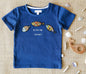 Organic cotton kids' navy blue T-shirt with colourful fish patches and Of-fish-ally Awesome! text-soft and playful summer wear for toddlers.