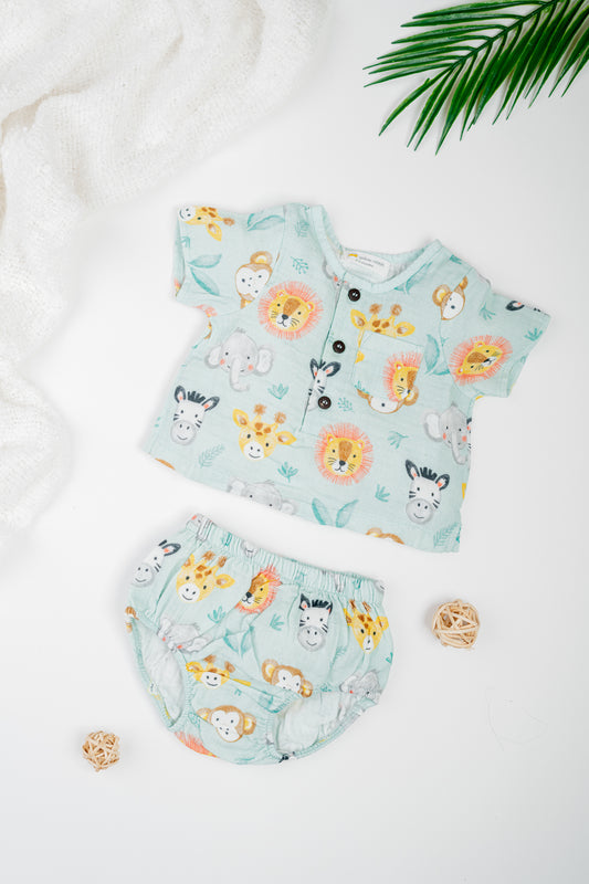 Organic cotton infant jhabla set with sleeves in animal print, paired with matching bloomers- breathable and gentle for newborns and babies.