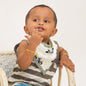 Soft organic baby bib with playful panda print on white background.