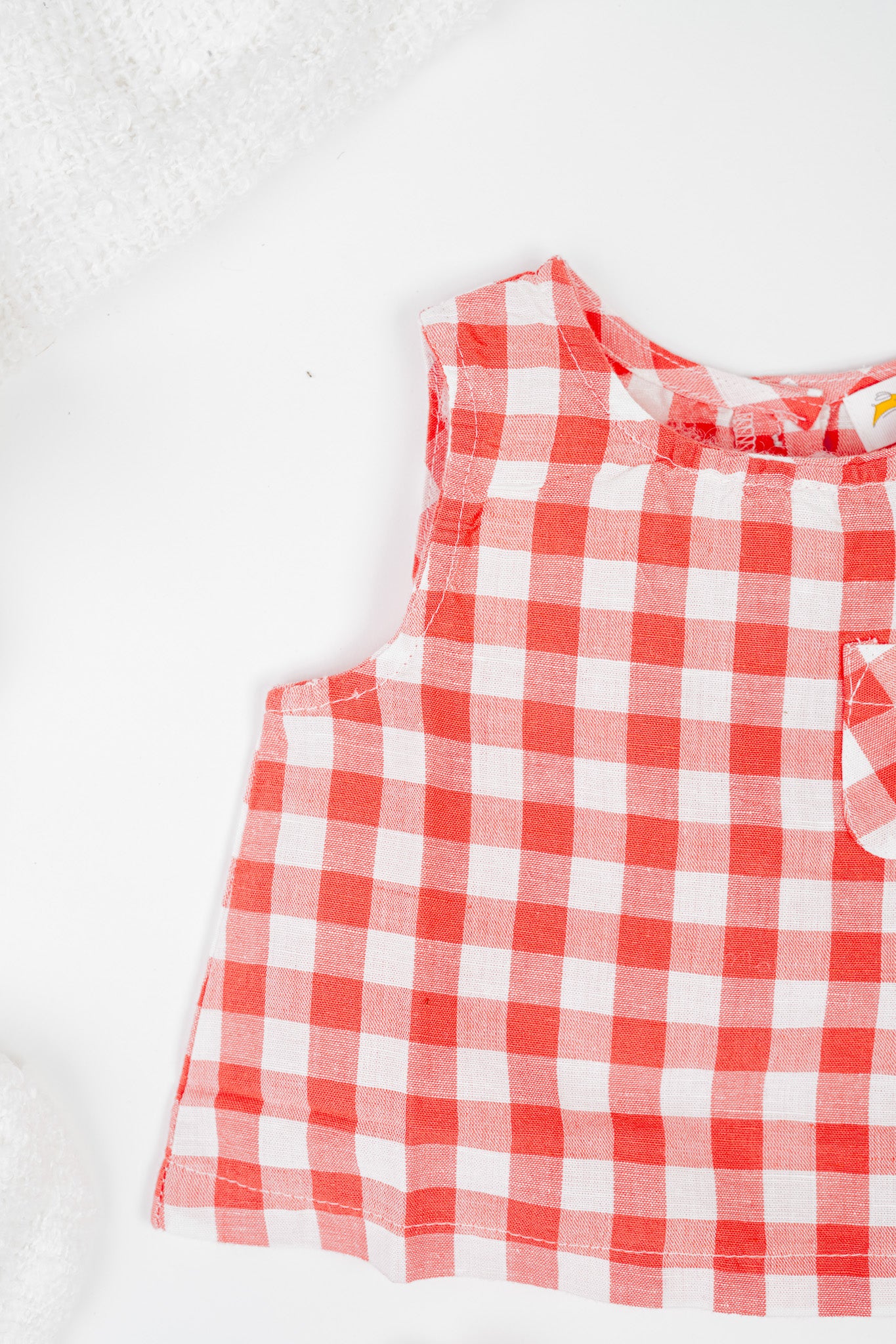 Soft, breathable, organic cotton  in red and white checks infant sleeveless jhabla set with bloomer- for everyday use.
