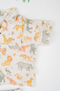 Organic cotton co-ord set with safari animals print, collared shirt and matching shorts.