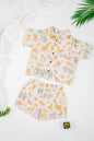 Organic cotton co-ord set with safari animals print, collared shirt and matching shorts.