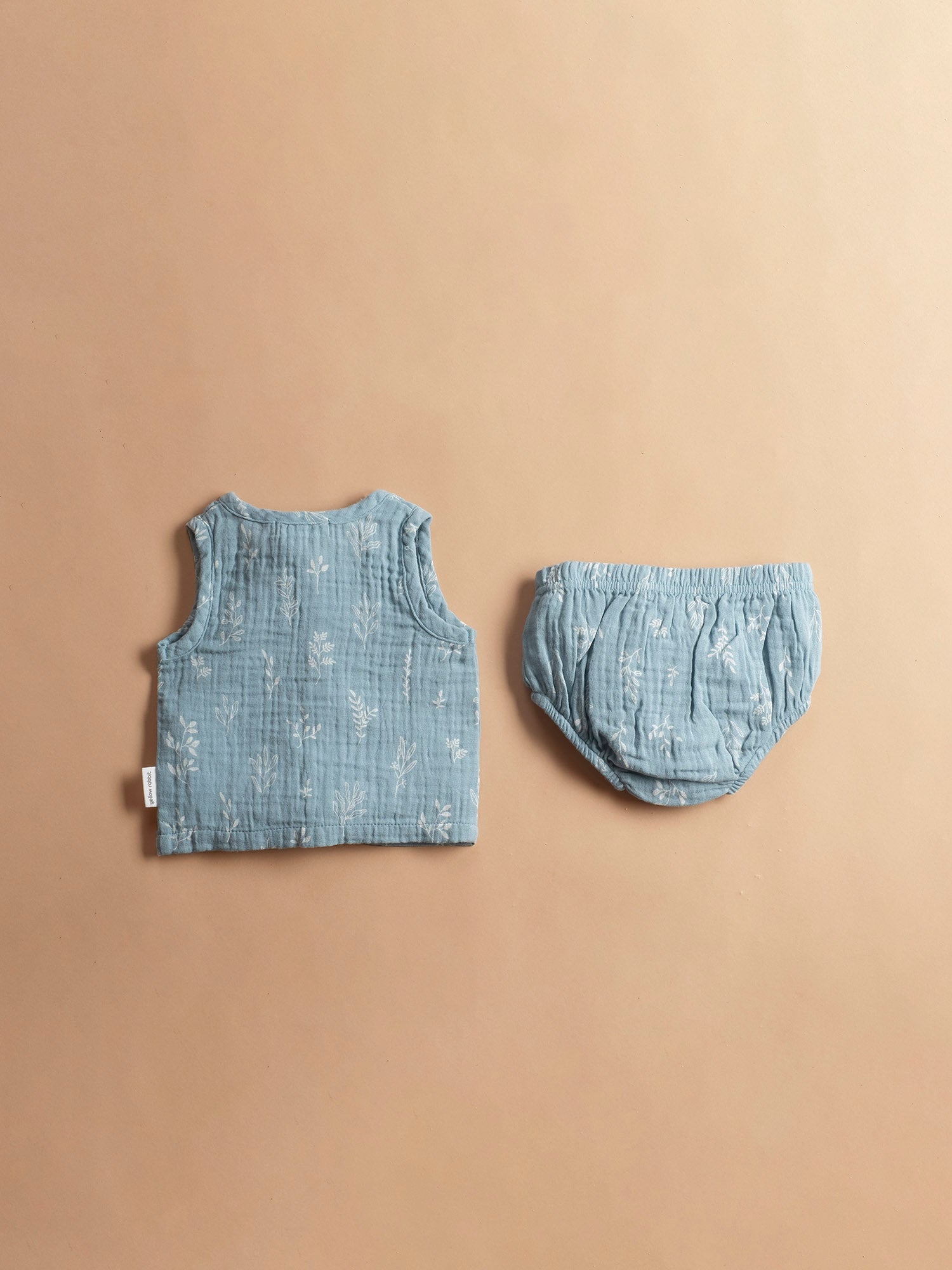 Infant Jhabla and bloomer set in teal sprig muslin print- ultra-soft, breathable fabric for newborns.