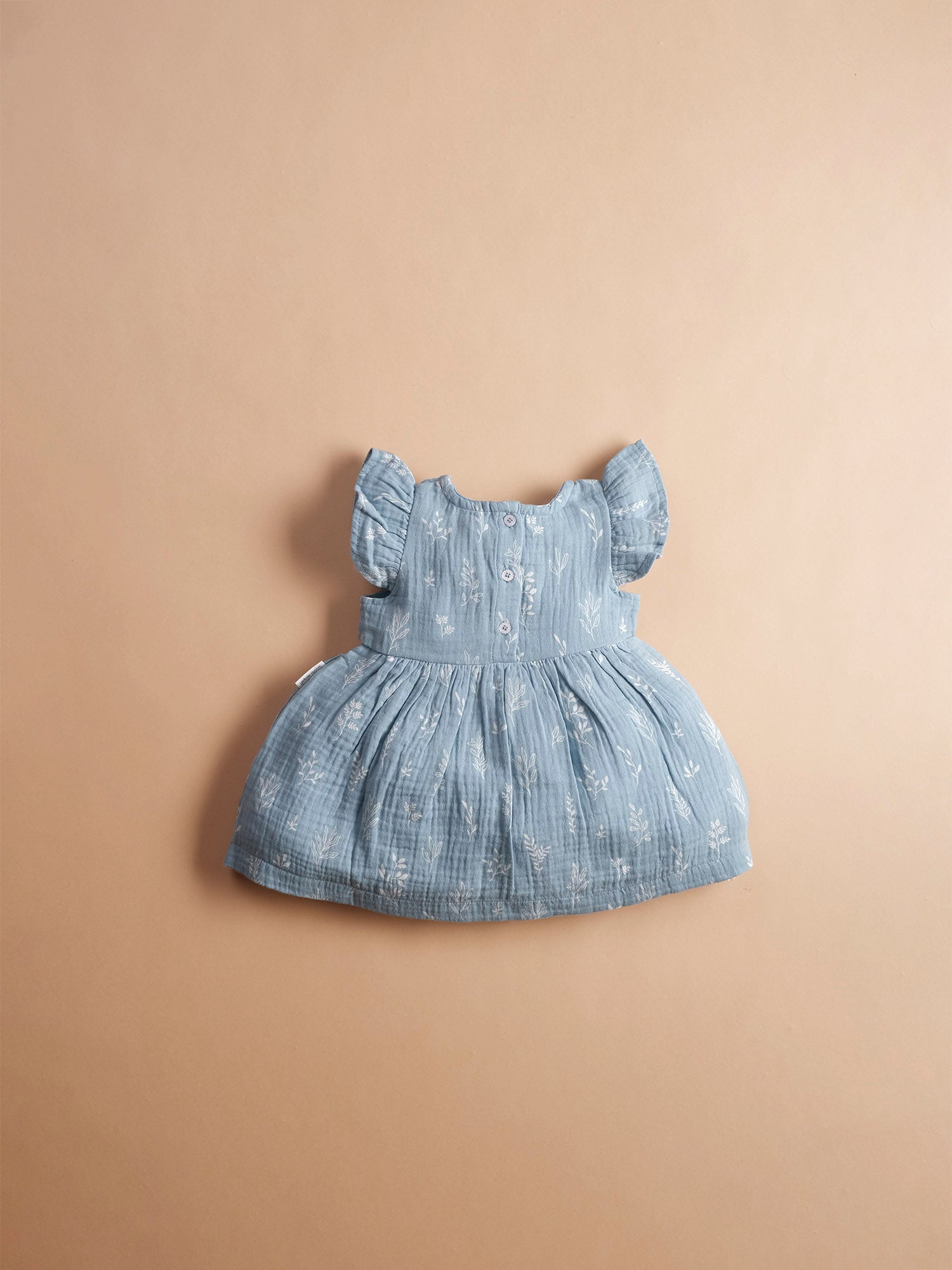 Teal sprig baby ruffle dress