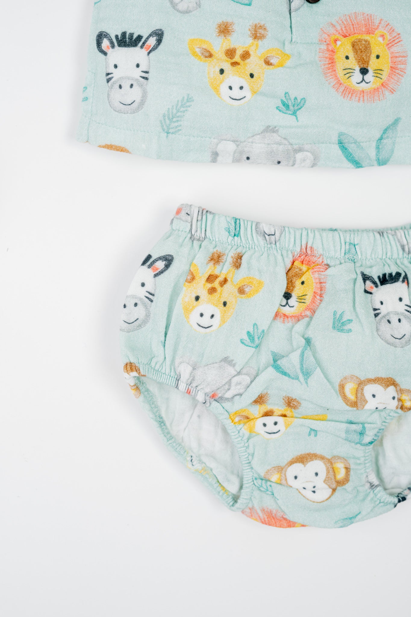 Organic cotton infant jhabla set with sleeves in animal print, paired with matching bloomers- breathable and gentle for newborns and babies.