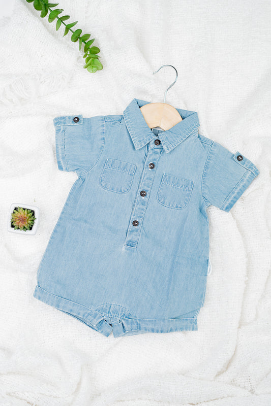 Classic blue denim overalls for babies and toddlers, made from soft organic cotton with front pockets, snap buttons for easy diaper changes.
