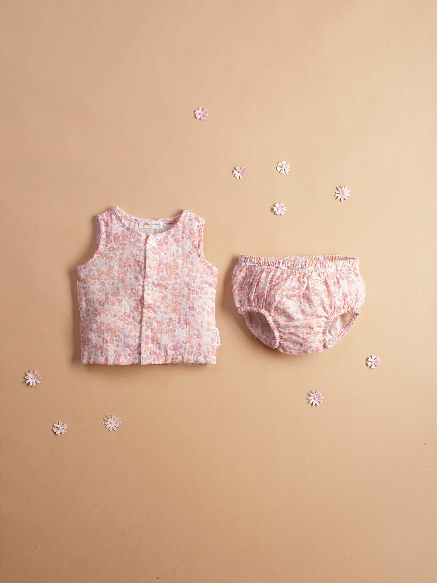 Soft muslin infant jhabla sei in cherry blossom print with matching bloomers-breathable and gentle for newborn skin.