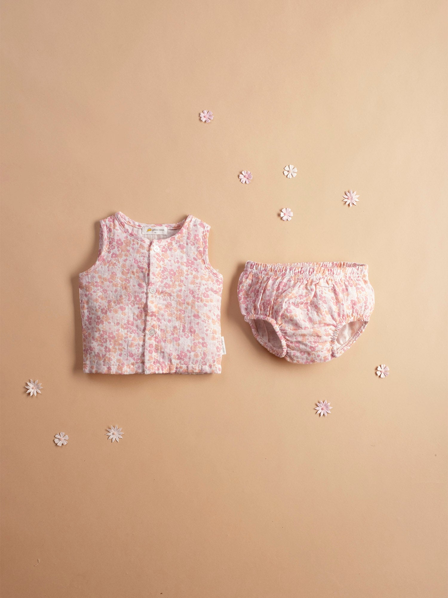 Soft muslin infant jhabla sei in cherry blossom print with matching bloomers-breathable and gentle for newborn skin.