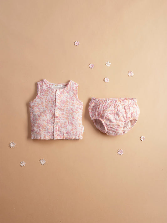 Soft muslin infant jhabla sei in cherry blossom print with matching bloomers-breathable and gentle for newborn skin.
