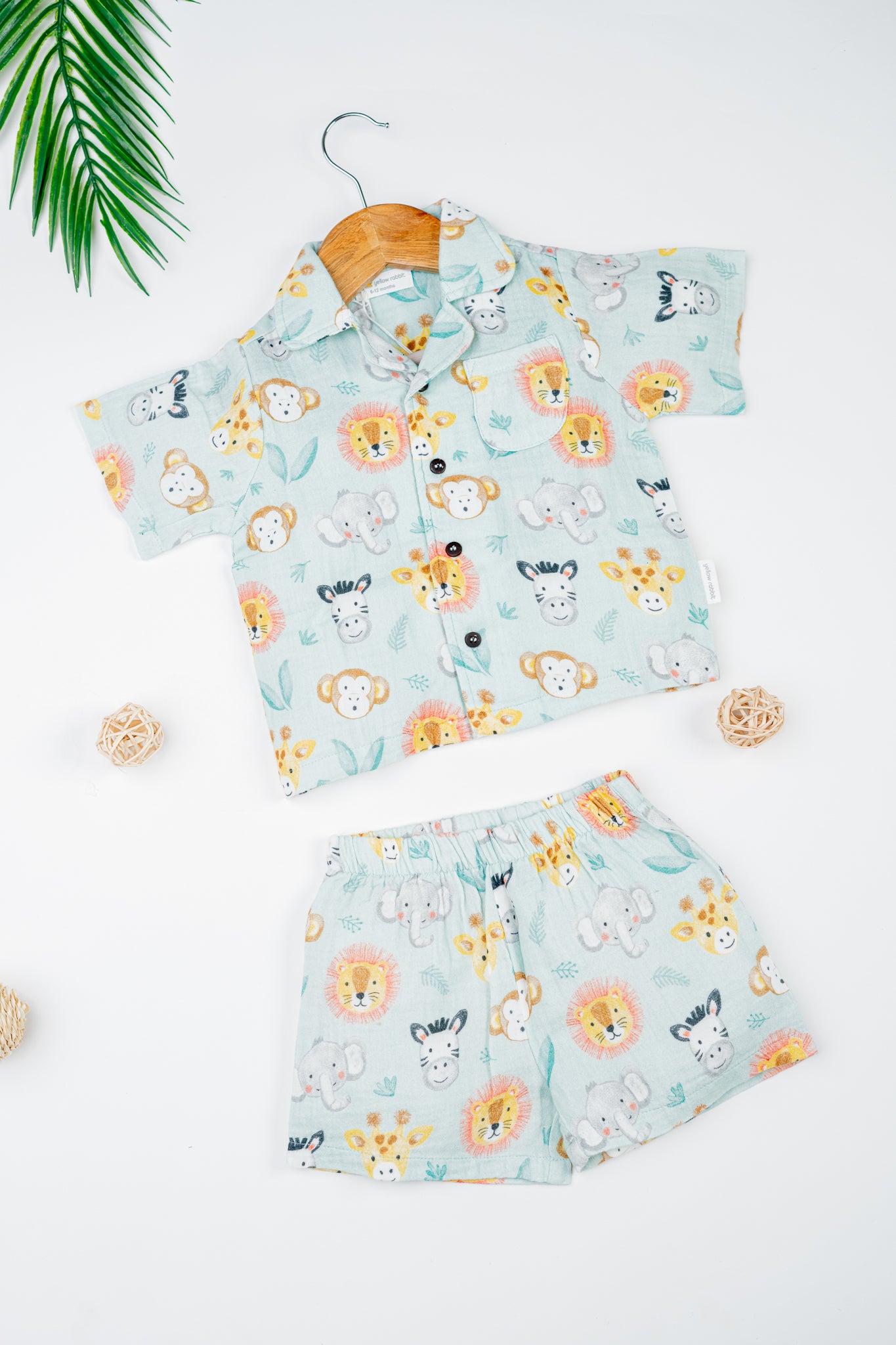 Organic cotton co-ord set with safari animal print, collared shirt, and matching shorts for kids- perfect for everyday wear.