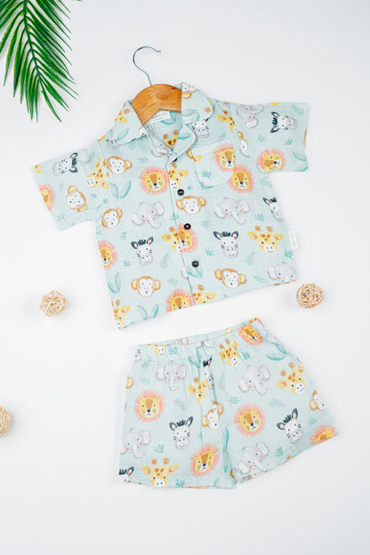 Organic cotton co-ord set with safari animal print, collared shirt, and matching shorts for kids- perfect for everyday wear.