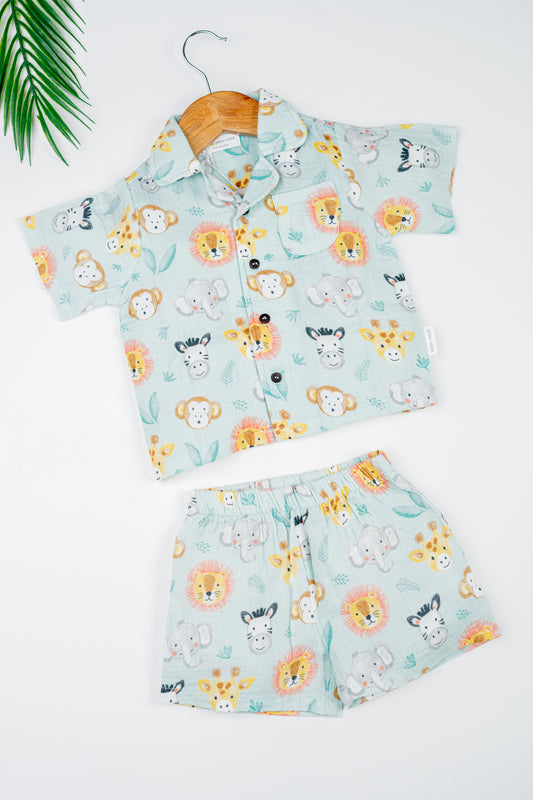 Organic cotton co-ord set with safari animal print, collared shirt, and matching shorts for kids- perfect for everyday wear.