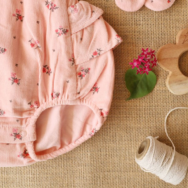 Blush ruffle butt romper