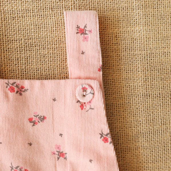 Blush ruffle butt romper