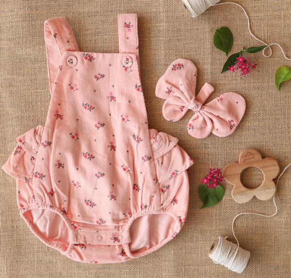 Blush ruffle butt romper