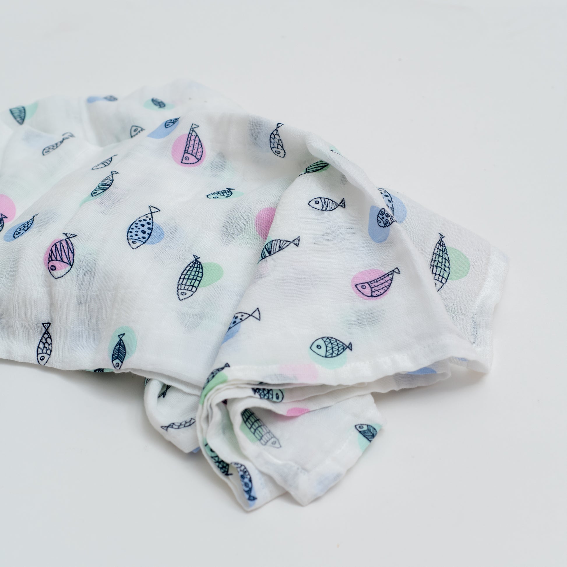organic cotton fish on polka dots swaddle blanket